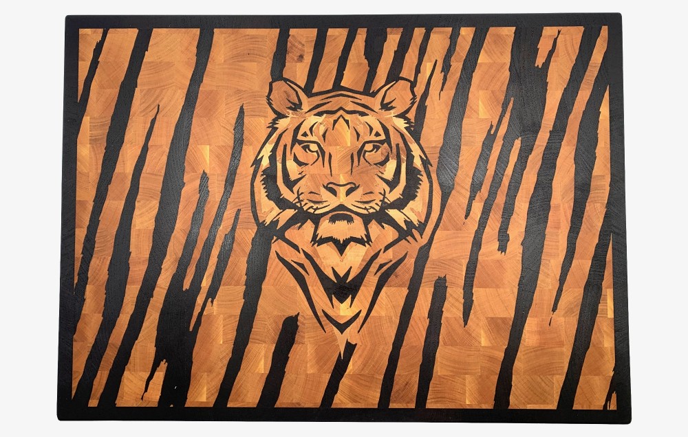 Tiger head on the background of tiger skin
