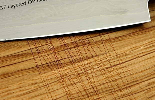 Image 1. Cuts at an oak face grain cutting board